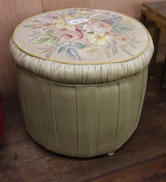 A tapestry top circular stool